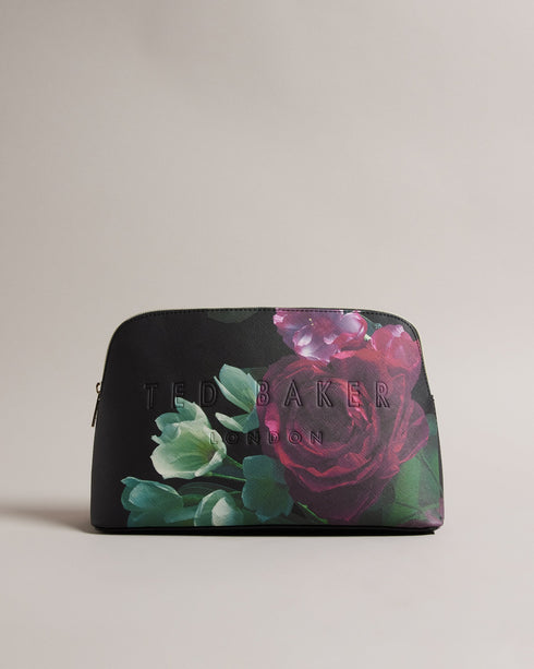 PAPIEE-Gifts-Keep your beauty routine on point, no matter where you go. The PAPIEE washbag features a stunning floral print, making it a chic addition to your travel essentials. Washbag Faux leather Floral print Zip fastening Debossed logo Dimensions: 9.5cm 17.5cm x 27cm- Ted Baker Romania